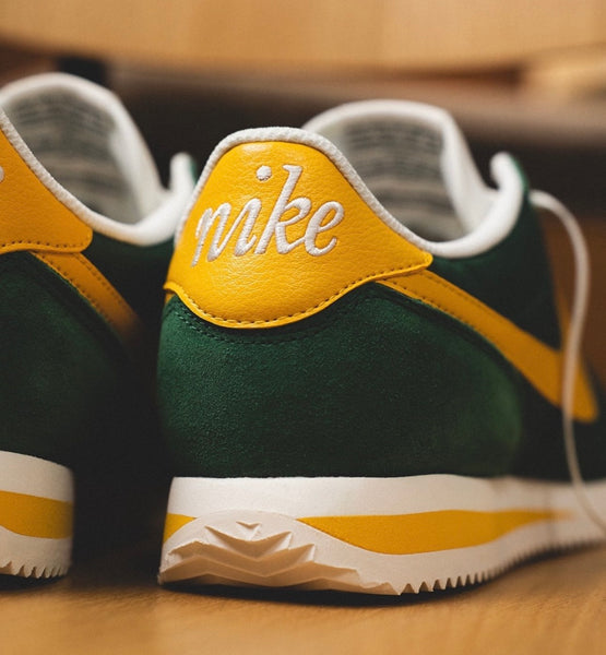 nike cortez green orange