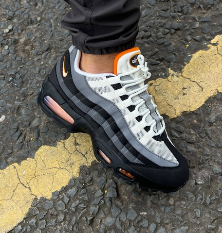 black white and orange nikes